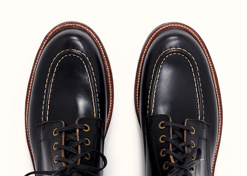 Black Chromexcel boot on a lug rubber outsole, cork filler over a steel shank