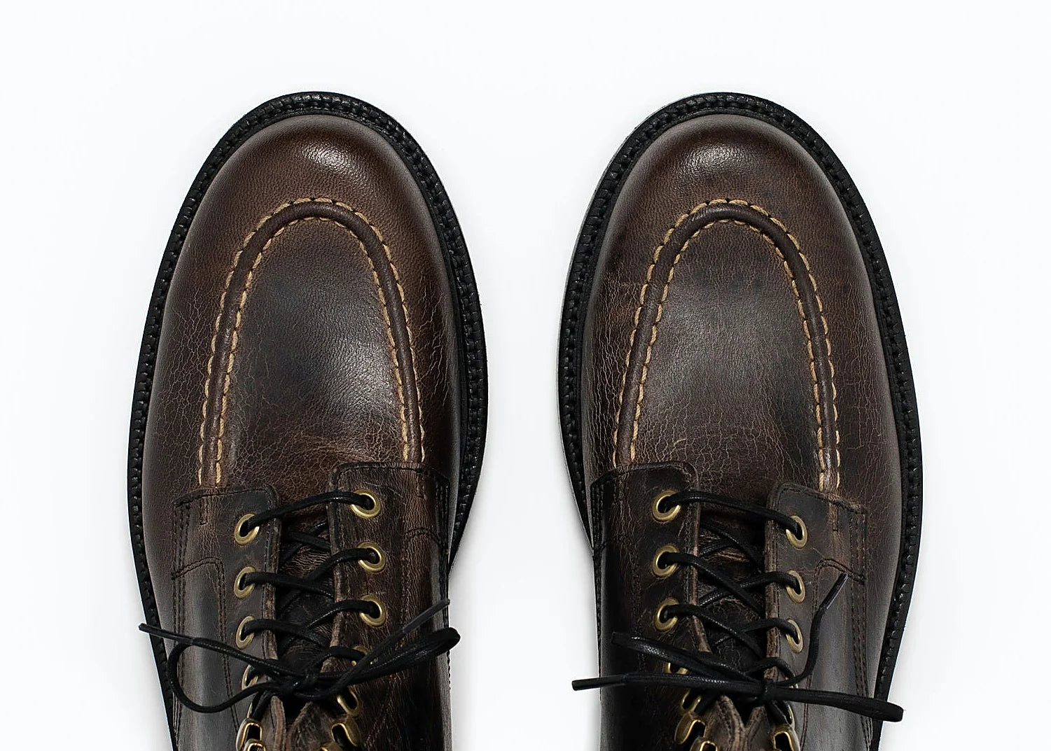 Black hand-sewn moc toe boot in Teton Waxy Stag deer, set on a Goodyear welt
