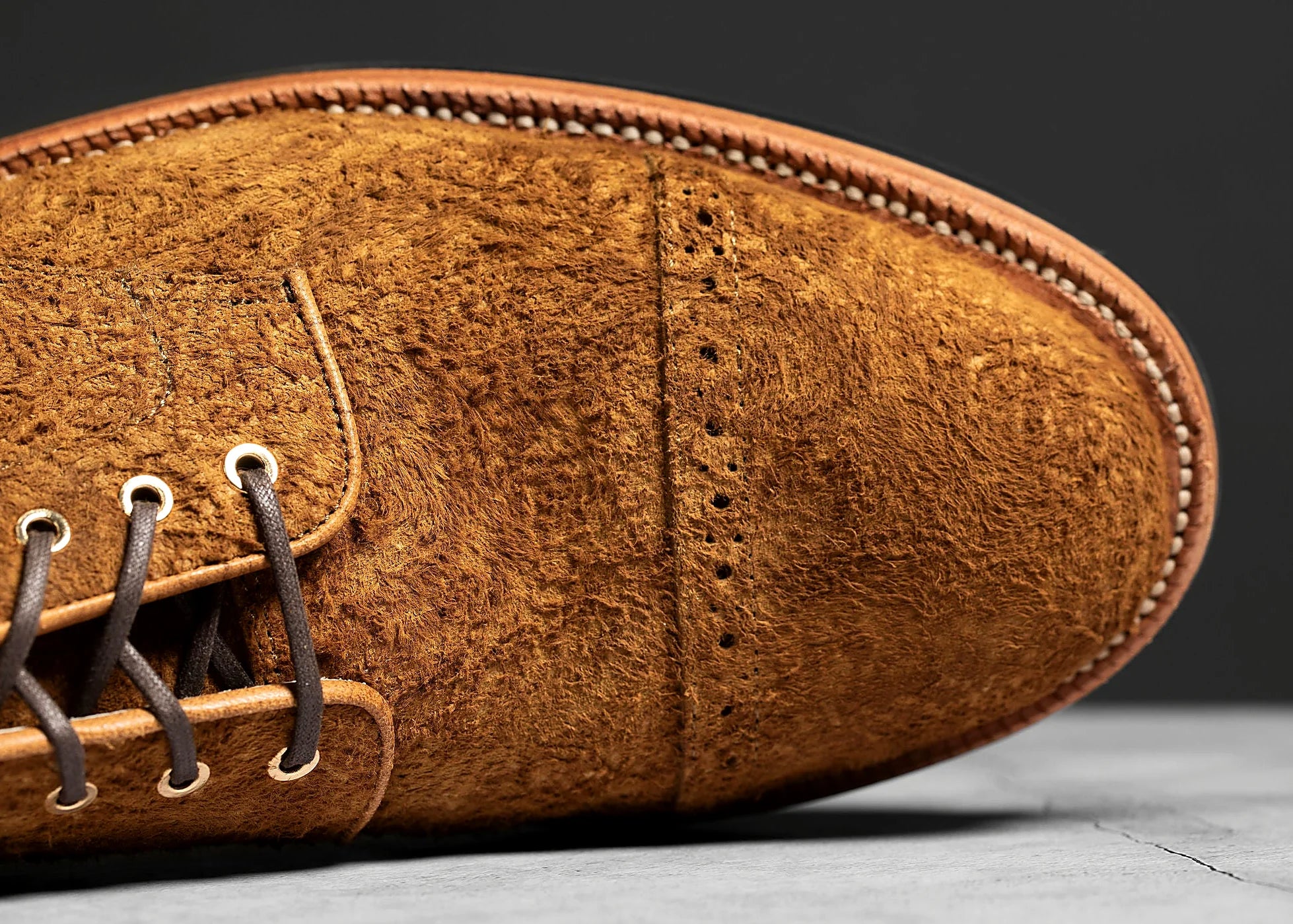 Bronze rough suede boot on a lug rubber outsole, cork filler over a steel shank