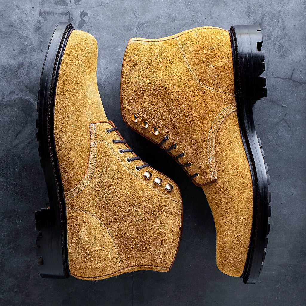 Butterum plain toe boot in Gum Oiled Desert Oasis, set on a lug rubber outsole