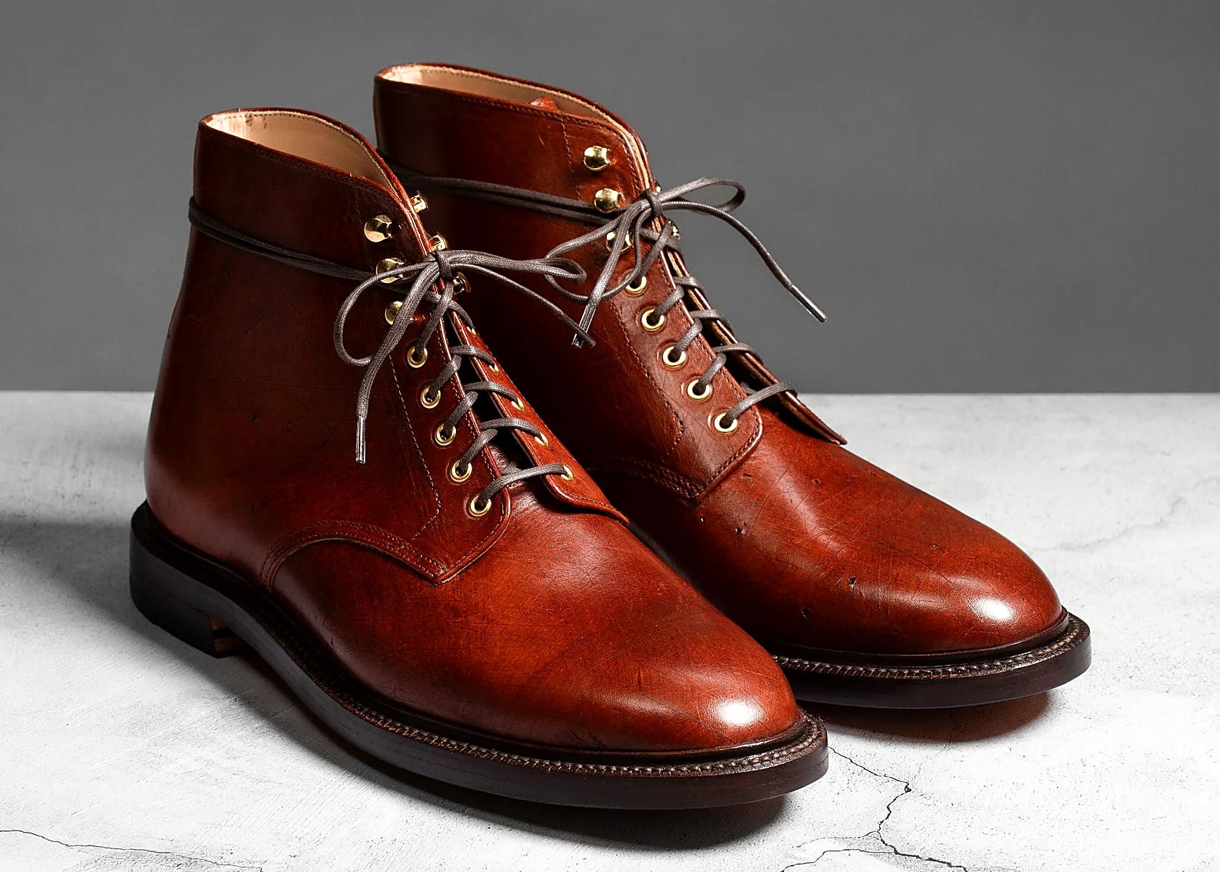 Cognac Ecbatana Lux boot on a double-bend leather outsole, cork filler over a steel shank