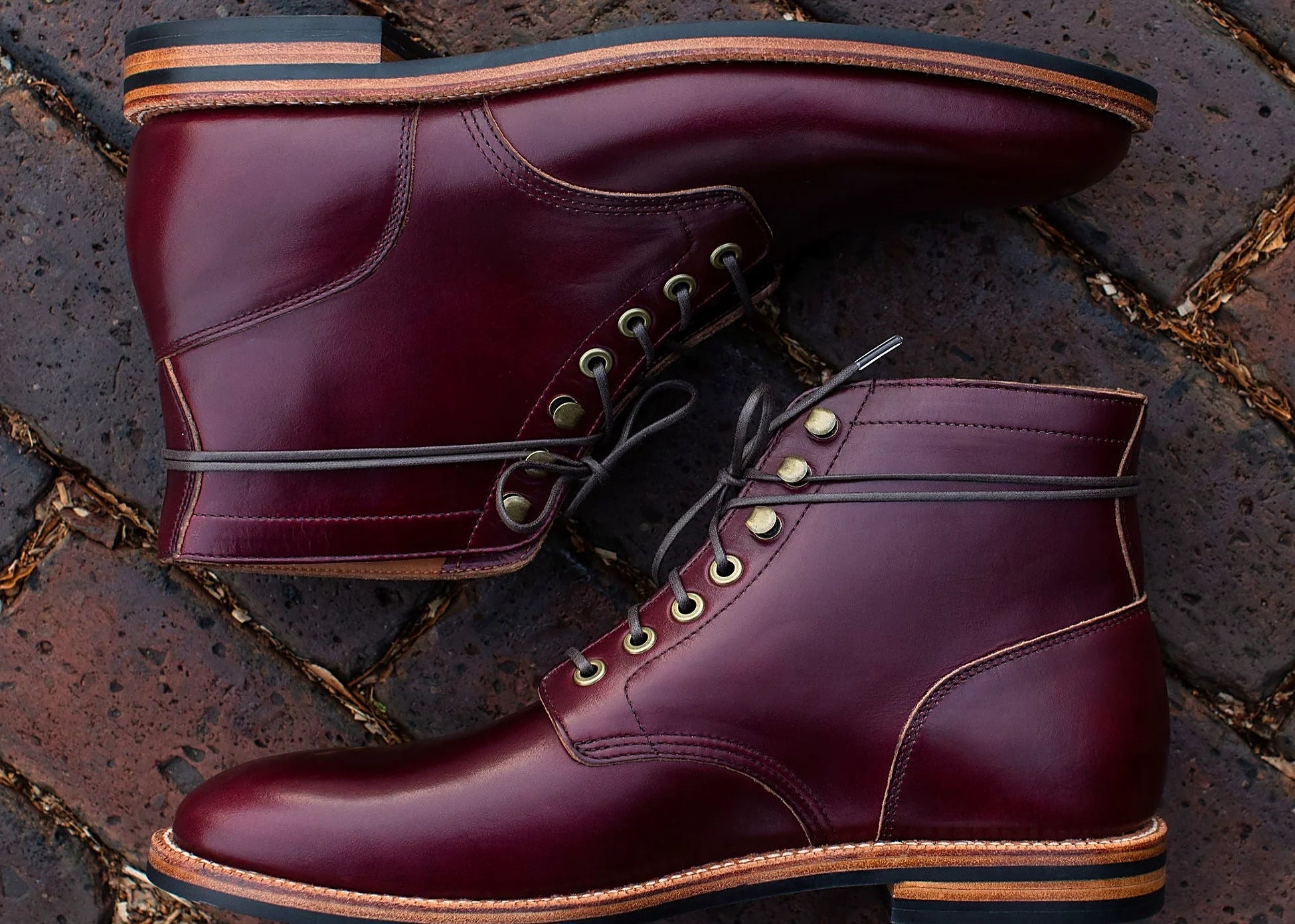 Color No. 8 plain toe boot in Chromexcel, set on a micro stud rubber outsole