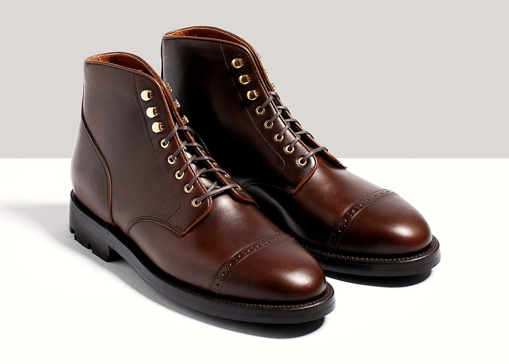 Crimson perforated cap toe boot in Chromexcel, set on a lug rubber outsole
