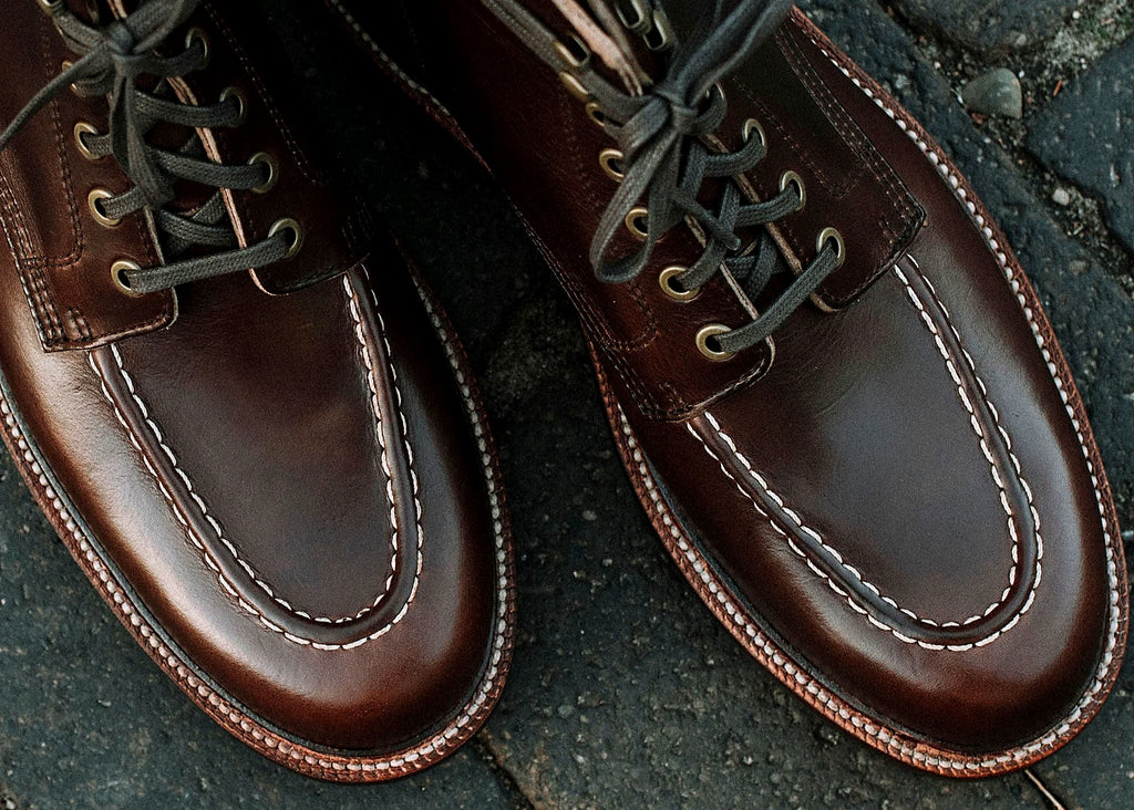 Crimson hand-sewn moc toe boot in Chromexcel, set on a lug rubber outsole