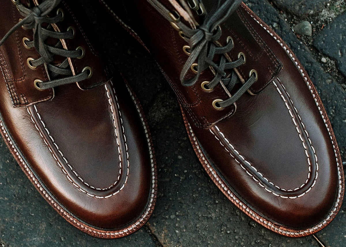 Crimson hand-sewn moc toe boot in Chromexcel, set on a lug rubber outsole