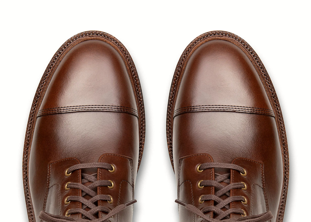 Crimson cap toe boot in Chromexcel, set on a micro stud rubber outsole