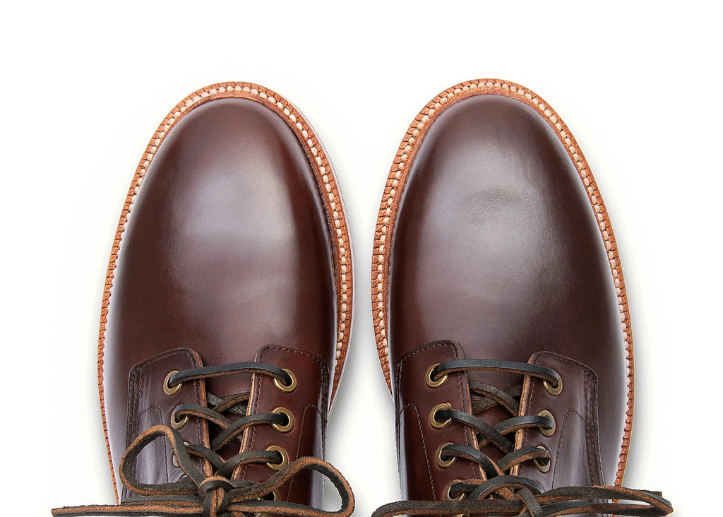 Crimson plain toe boot in Chromexcel, set on a micro stud rubber outsole