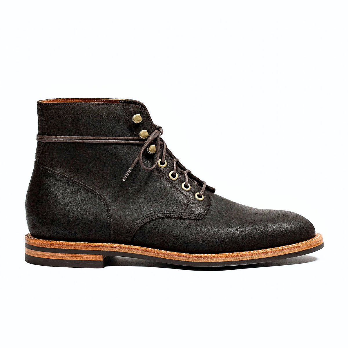 Earth Waxed Commander boot on a micro stud rubber outsole, cork filler over a steel shank