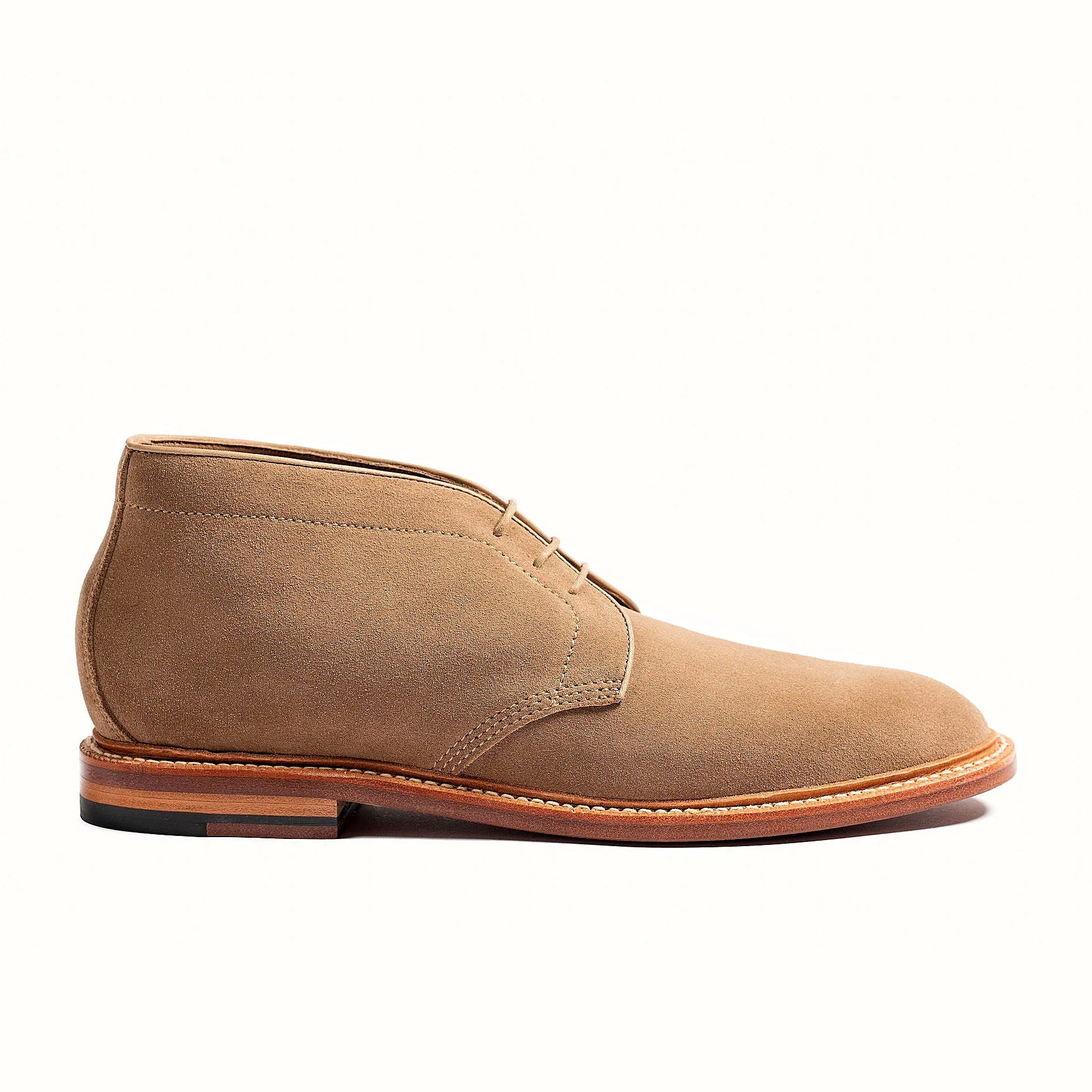 Sand unlined chukka boot in Janus Butt suede, set on an oil-dipped butyl leather outsole