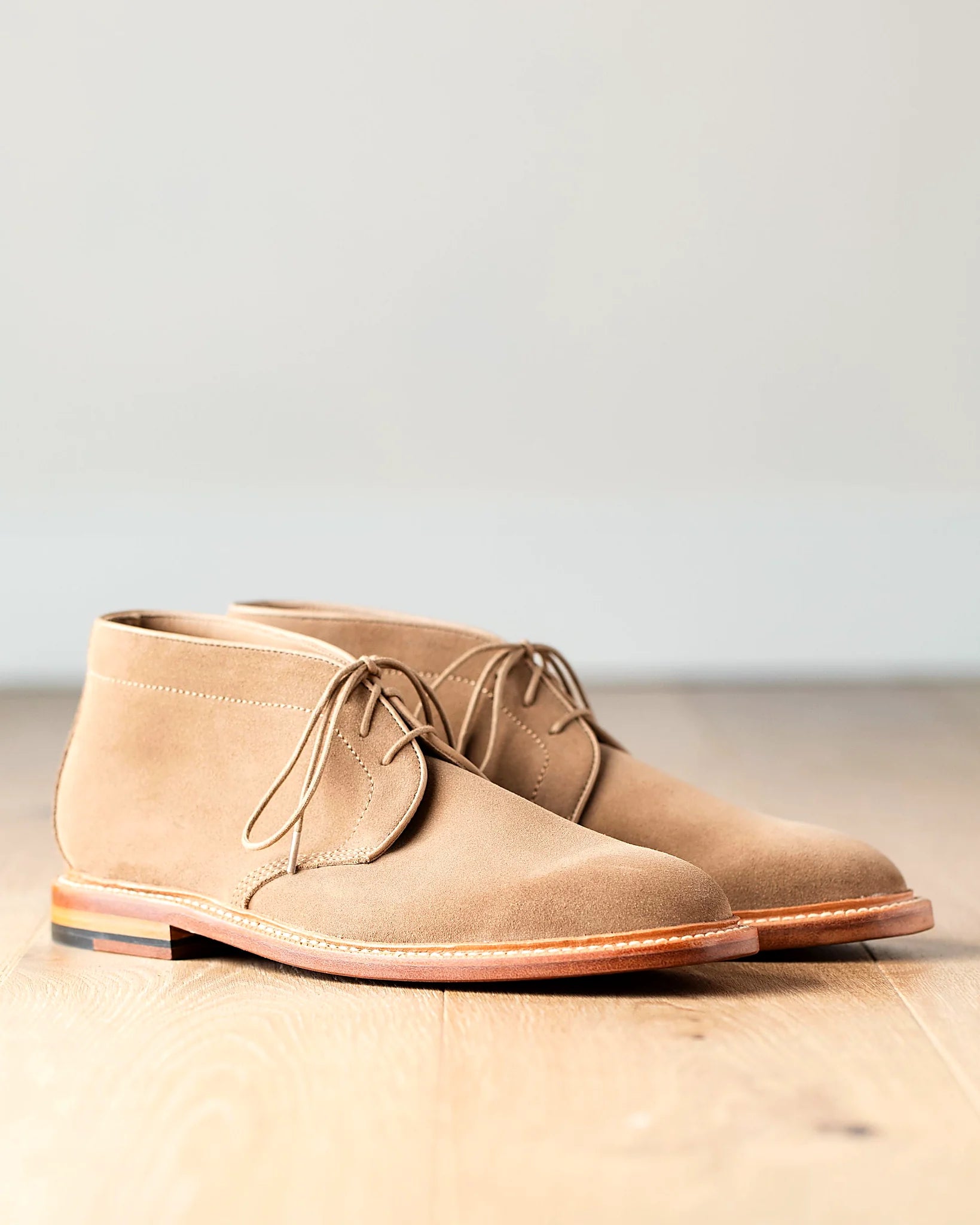 Sand Janus Butt suede boot on an oil-dipped butyl leather outsole, cork filler over a steel shank