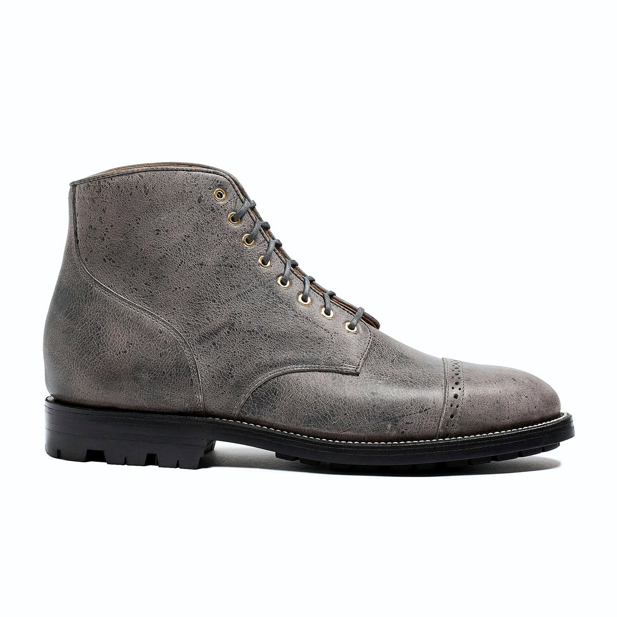 Goodyear welted perforated cap toe service boot in Storm grey Waxed Kudu, full-grain leather heel counters