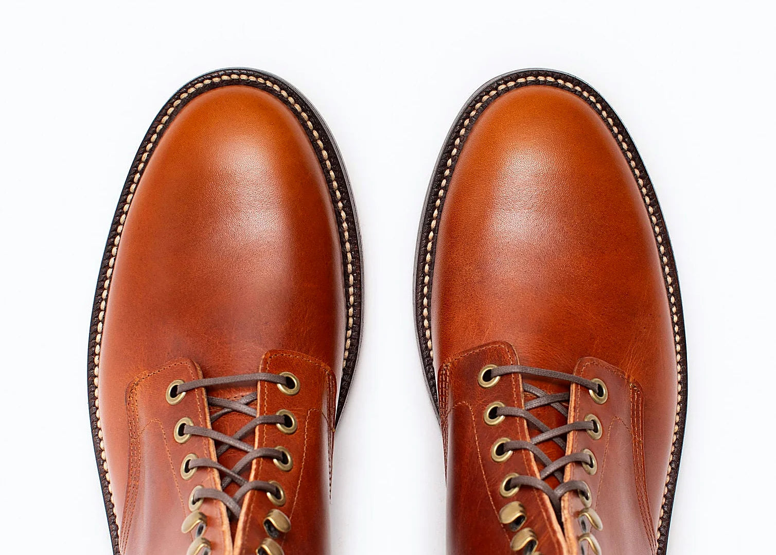 Tan plain toe boot in Brooklyn Calf, set on a micro stud rubber outsole