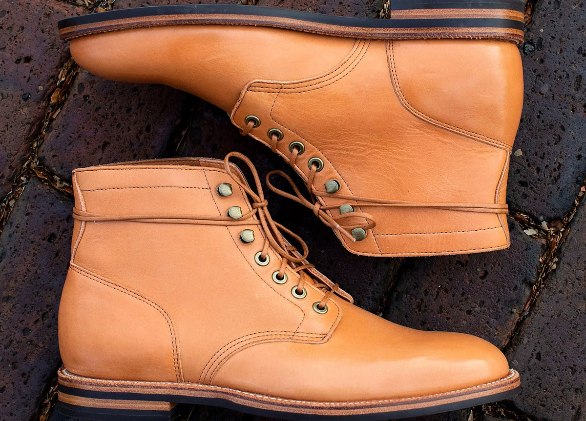 Tan Essex boot on a micro stud rubber outsole, cork filler over a steel shank
