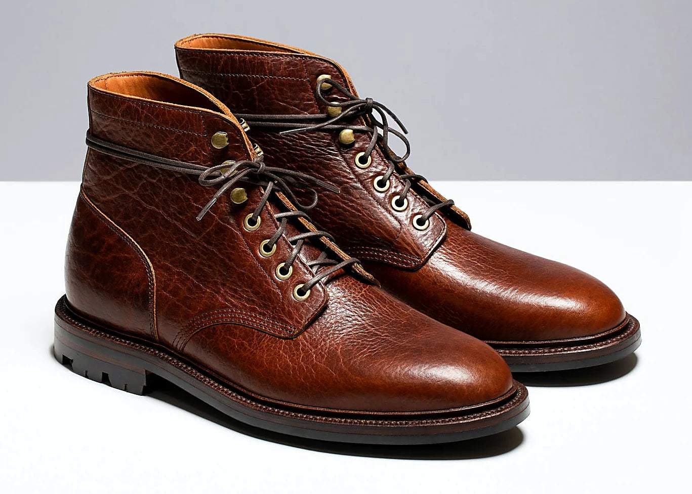 lace-to-toe boot in Walnut American Bison with antique brass eyelets and speed hooks